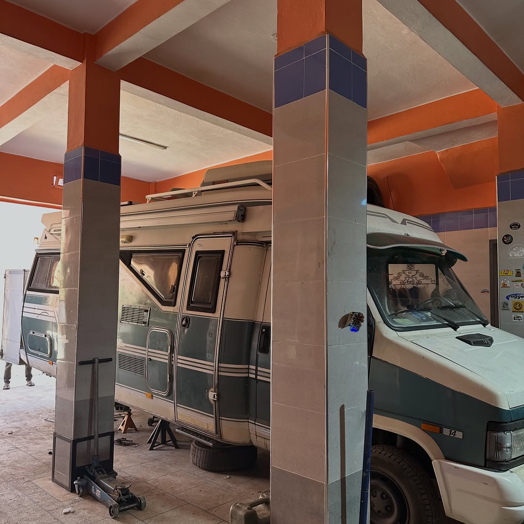 Austrian classic camper raised on hydraulic jacks for suspension upgrade at Garage Iriki Zagora